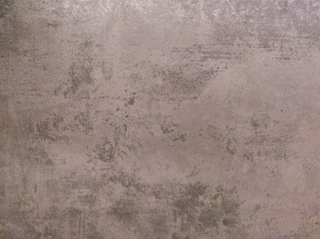 An old concrete wall with scuffs. Gray matte background.の写真素材