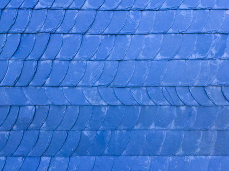 The old blue tile wall. Blue stone background. The texture of the tile. Brickwork.の写真素材