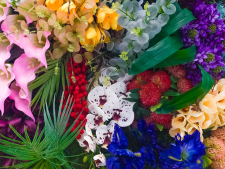 Bright floral background with beautiful, colorful flowers. A beautiful wall of bright, colorful flowers. Close-up of flowers.の写真素材