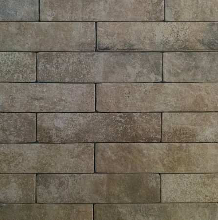 The brick wall is grey. Brick gray background. The texture of a gray brick.の写真素材