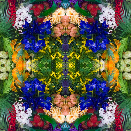 Bright floral background with beautiful, colorful flowers. A beautiful wall of bright, colorful flowers. Close-up of a blue flower. Seamless image. Symmetricalの写真素材