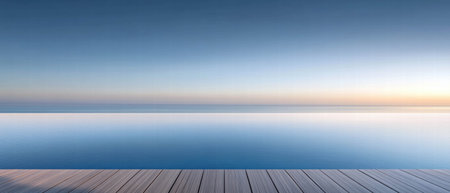 Serene infinity pool merges with ocean horizon at duskの素材