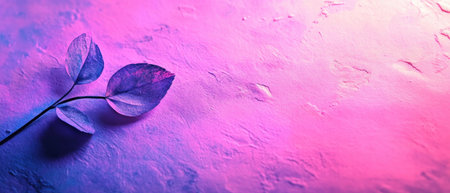 Vibrant handmade paper featuring pressed flowers in bright colors and unique texturesの素材