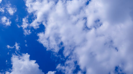 Blue with white clouds. Beautiful photo of heaven in high quality. Stock image of clouds.の写真素材