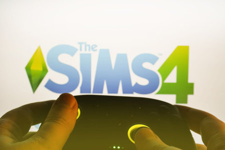 Gamer plays Sims 4 with a gamepad. Stock editorial photo. Ukraine. Kiev. 04.14.2024