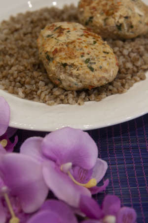Chicken meat balls with herbs and spices with buckwheatの写真素材