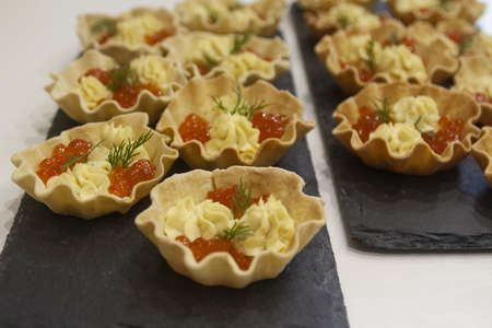 Home-made bread tartlets for fish caviar snacks and egg sauceの写真素材