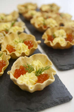 Home-made bread tartlets for fish caviar snacks and egg sauceの写真素材