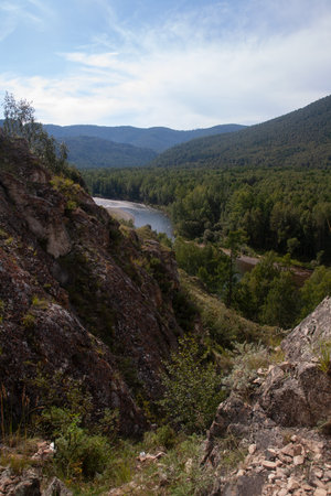 Mountain landscape with river and sky - natural monument Shamans trail in the Republic of Khakassia