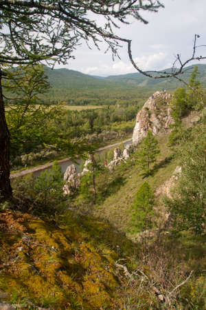 Mountain landscape with river and sky - natural monument Shamans trail in the Republic of Khakassiaの写真素材