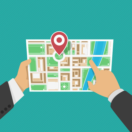 Paper Map In Hand in flat style. Vector Illustration of cartoon hands hold folded map of city a location marker. Location map, gps navigation, direction, positioning, travel destination concepts.のイラスト素材