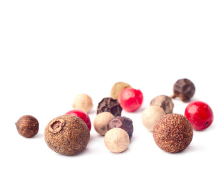 mix of different peppers on white backgroundの写真素材