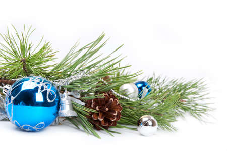 Christmas background with blue ball and pine branchの写真素材