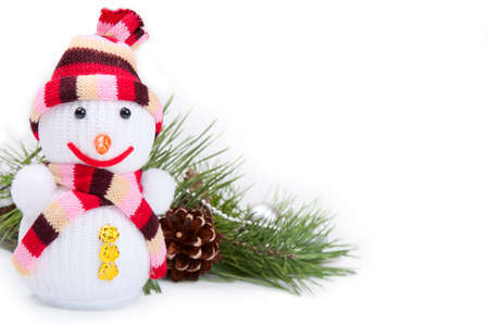 Christmas background with snowman and pine branchの写真素材