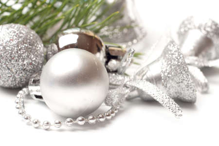 Christmas background with white balls and silver bellの写真素材