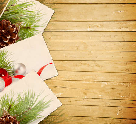 wooden Christmas background with old photosの写真素材