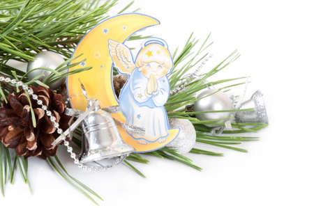 Christmas background with  pine branch and angelの写真素材
