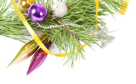 Christmas background with yellow ribbon and pine branch の写真素材