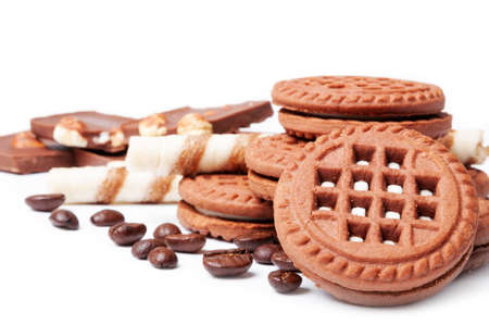 Cookies, chocolate and coffee beans on a white backgroundの写真素材
