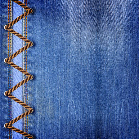 Blue jeans texture background with lacingの写真素材