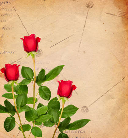 Vintage decorative background with red roses and postal cardsの写真素材