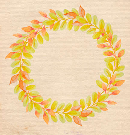 Round watercolor floral frame with yellow autumn leavesの写真素材