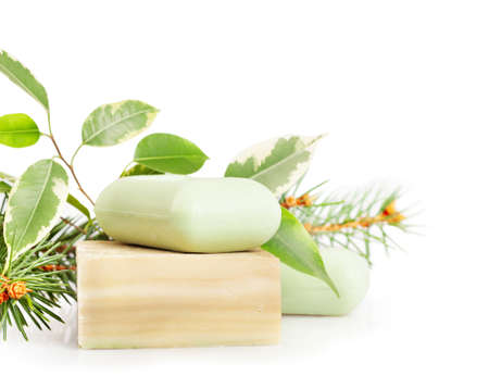 Bars of herbal handmade soap on a white backgroundの写真素材