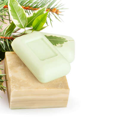 Bars of natural herbal handmade soap on a white backgroundの写真素材