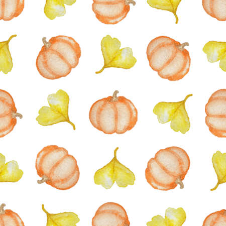Watercolor seamless pattern with orange ripe pumpkin and yellow leaves on a white backgroundの写真素材