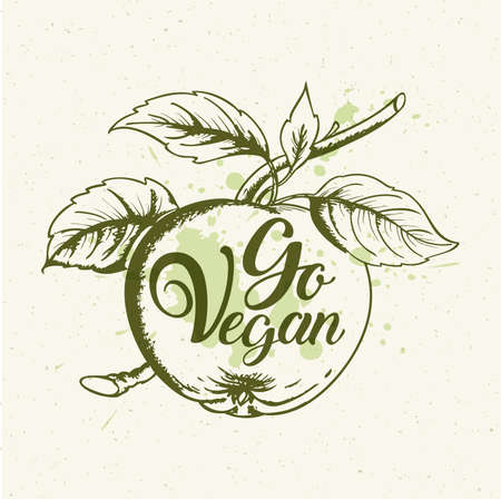 Green apple, leaves and lettering Go vegan. Vegetarian lifestyle concept. Hand drawn vector illustrationのイラスト素材
