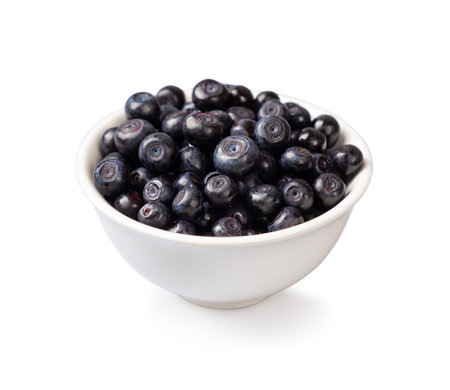 Fresh blueberries in a white plate on a white background.の写真素材