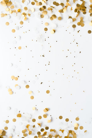 Clean New Years flat lay with gold confetti and white background AI generated illustrationの素材