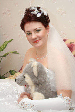 Bride with soft toyの写真素材