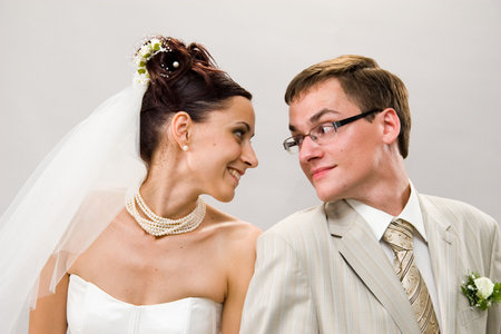 Married. Newlywedses look friend on friendの写真素材