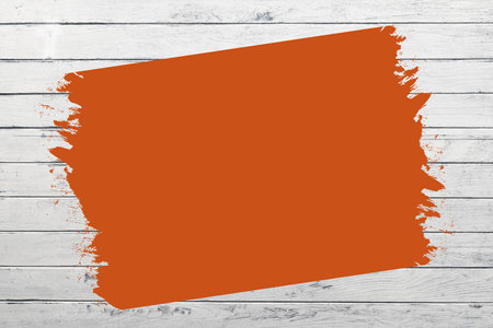 Orange brush texture background. Abstract brush background, flat shapes. On a white wooden wallの写真素材