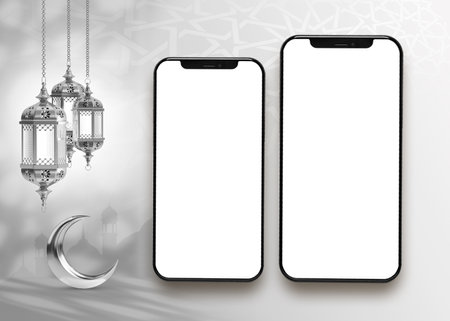 Two phones are next to a crescent moon and a crescent moon islamic ramadan greeting background  .smartphone  mockupの写真素材