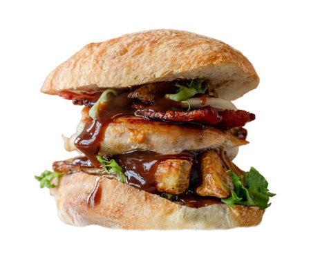 Chicken burger, delicious double burger with crispy chicken meat, salad and sauce isolated on white background .white burger with a big chicken grilled cutlet, with lettuce, juicyの写真素材