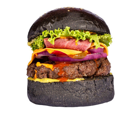 Classic cheeseburger blackened with sesame and pickles. Cheese, tomatoes, onions. Lettuce, mustard and ketchup isolated on white background. Fresh delicious burger isolatedの写真素材
