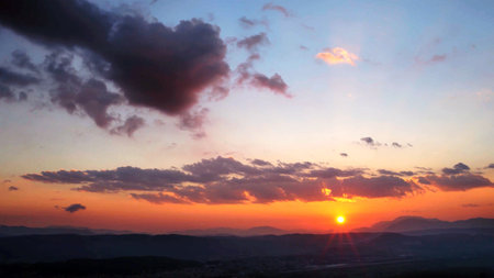 Morning light mountain view, golden sunrise moment. Beautiful landscape with blue sky. Travel destination .Sky clouds at sunset over the horizon, summer season background,の写真素材