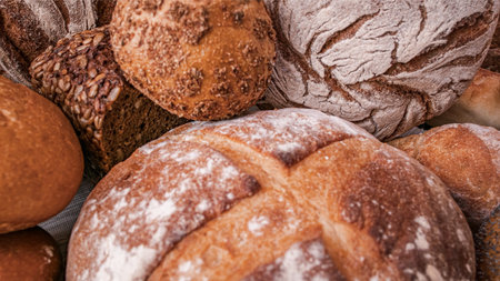Breads. Assorted types breads. Bakery products. Fresh fragrant bread on the table. Food concept ....