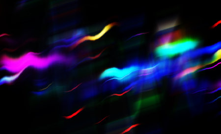 Colorful glow sparks of light texture. Orange red rays on dark blue abstract layer black background .Crystal flare abstract effect. Holographic sunlight reflection wallpaper,の写真素材