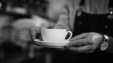 Close-up of Americano pouring from the coffee machine into a cup. Professional coffee brewing black coffee . Professional espresso machine while preparing espressos coffee cupの写真素材