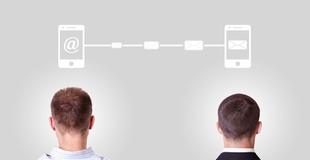 two people communicate with phoneの写真素材