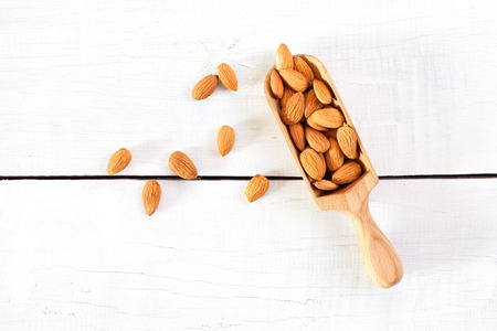 Almond on white wooden tableの写真素材