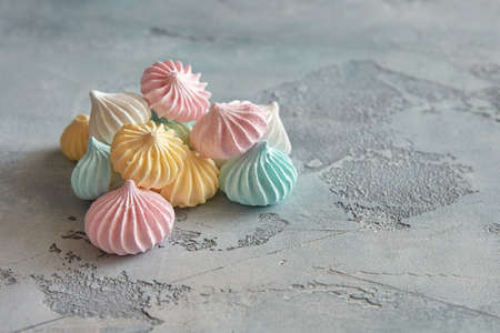 Pastel colored meringue on a beautiful textural background.の写真素材