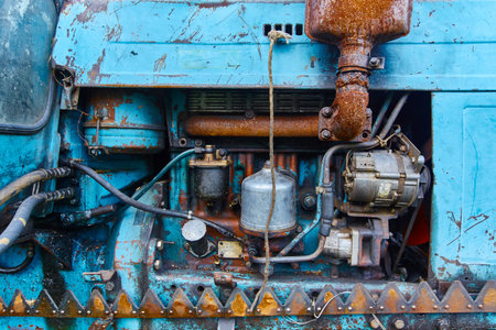 Old automobile tractor engine, background.