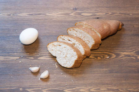 Bran bread eggs and garlicの写真素材