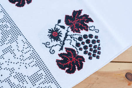 Towel for the icon with the red-black Ukrainian embroidery, selective focusの写真素材