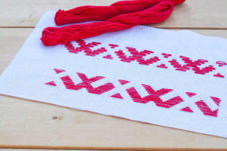 Ukrainian national red embroidery thread, selective focusの写真素材