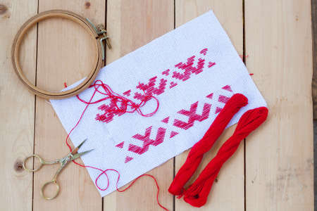 Ukrainian national red embroidery thread, selective focusの写真素材